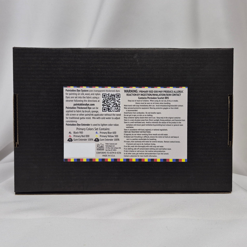 Black box with label highlighting Black, Blue, Red and Yellow and including saftey instruction, Paintables Dye System information and First-Aid Instructions